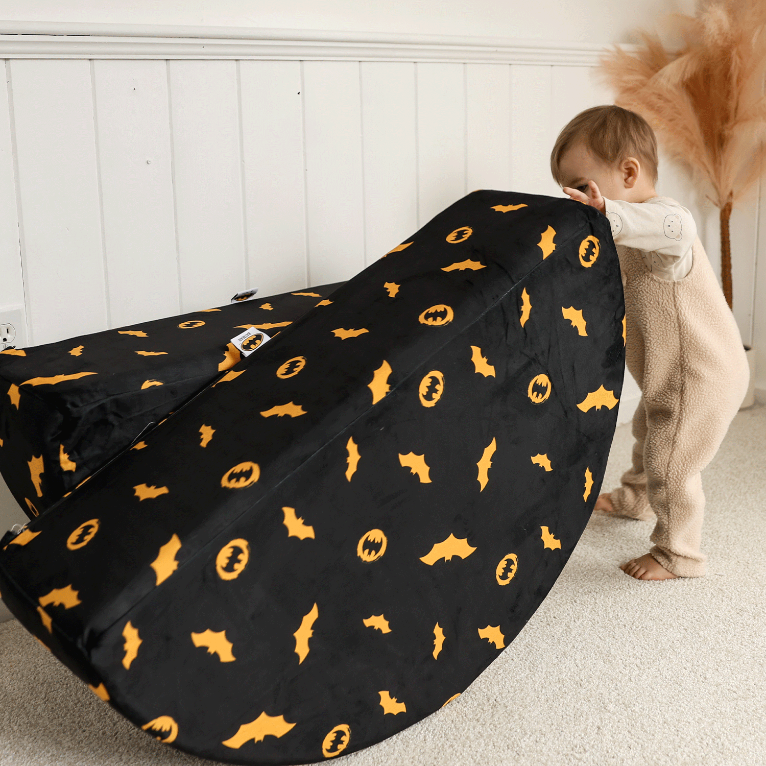 Child playing with Batman™ x Roo & You™ Rocker Set