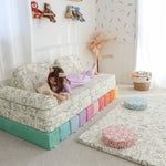 Playroom with Miffy™ x Roo & You™ Joey Play Couch and play mat covered in bunny print.