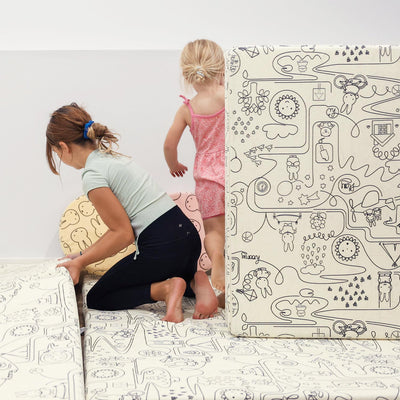 Kids playing with Miffy™ x Roo & You™ Joey Play Couch covered in bunny print.