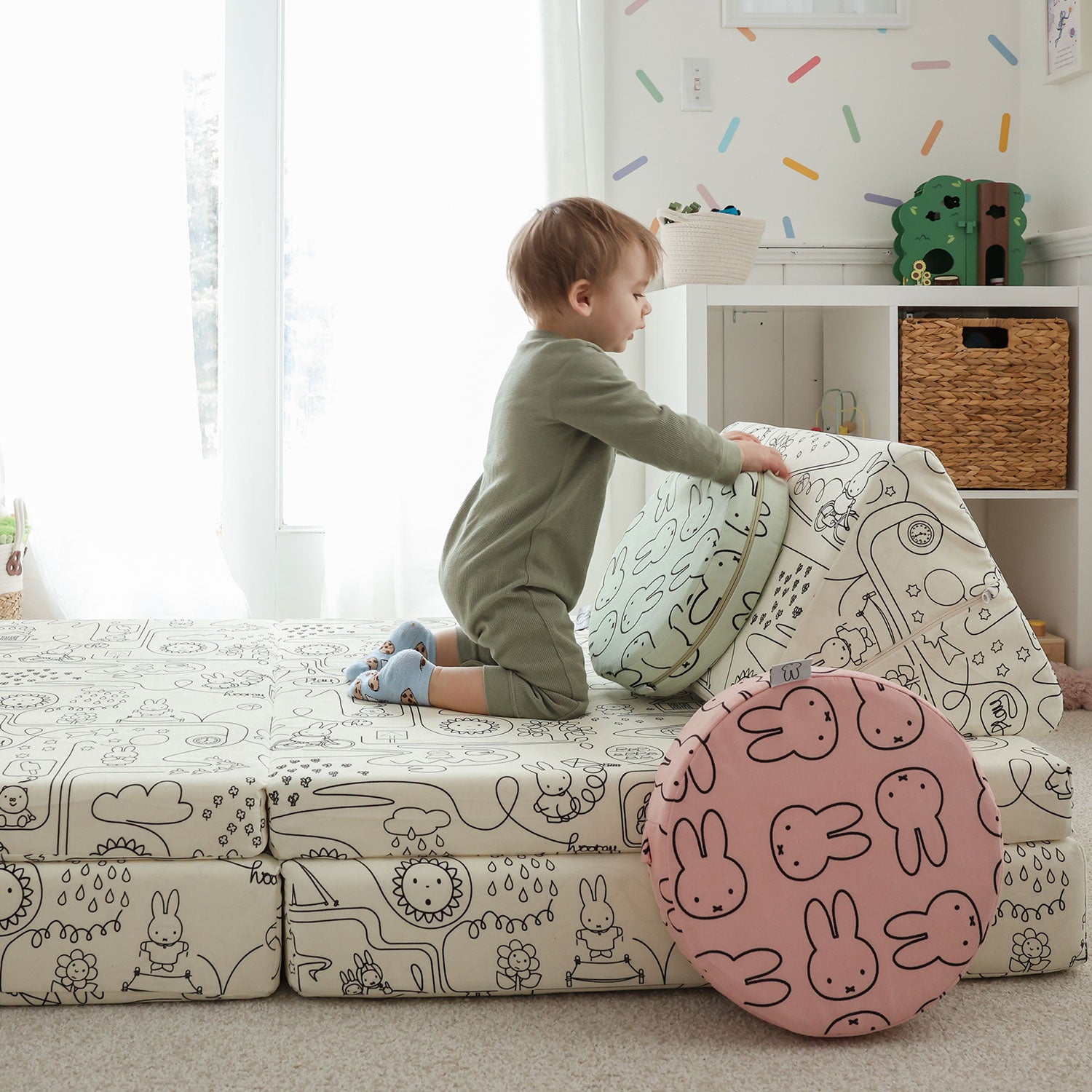 Child playing with colorful Miffy Stepping Stones with bunny print
