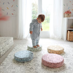 Child stepping on colorful Miffy Stepping Stones with bunny print